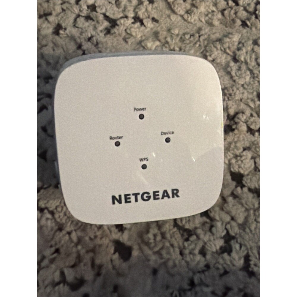 Netgear AC1200 WiFi Range Extender, specifically model EX611